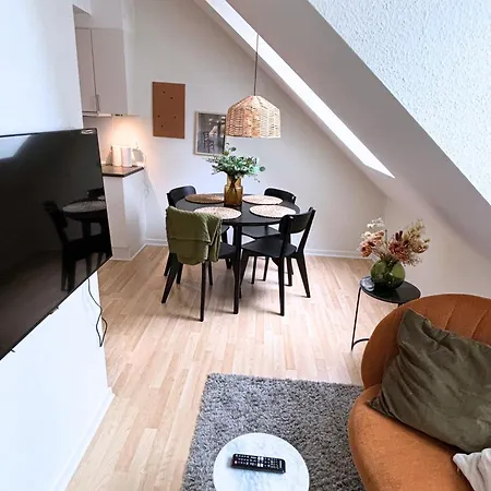 Apartmán Charmerende Taglejlighed