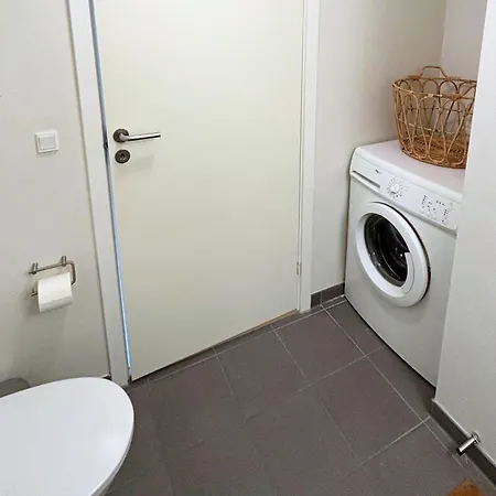 Apartmán Charmerende Taglejlighed *