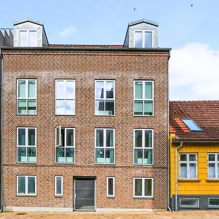 Apartmán Charmerende Taglejlighed